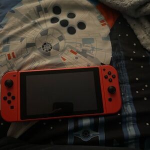 Nitendo switch mario red edition with nitendo controller (no dock )